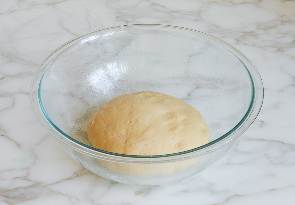 dough in bowl ready to rise