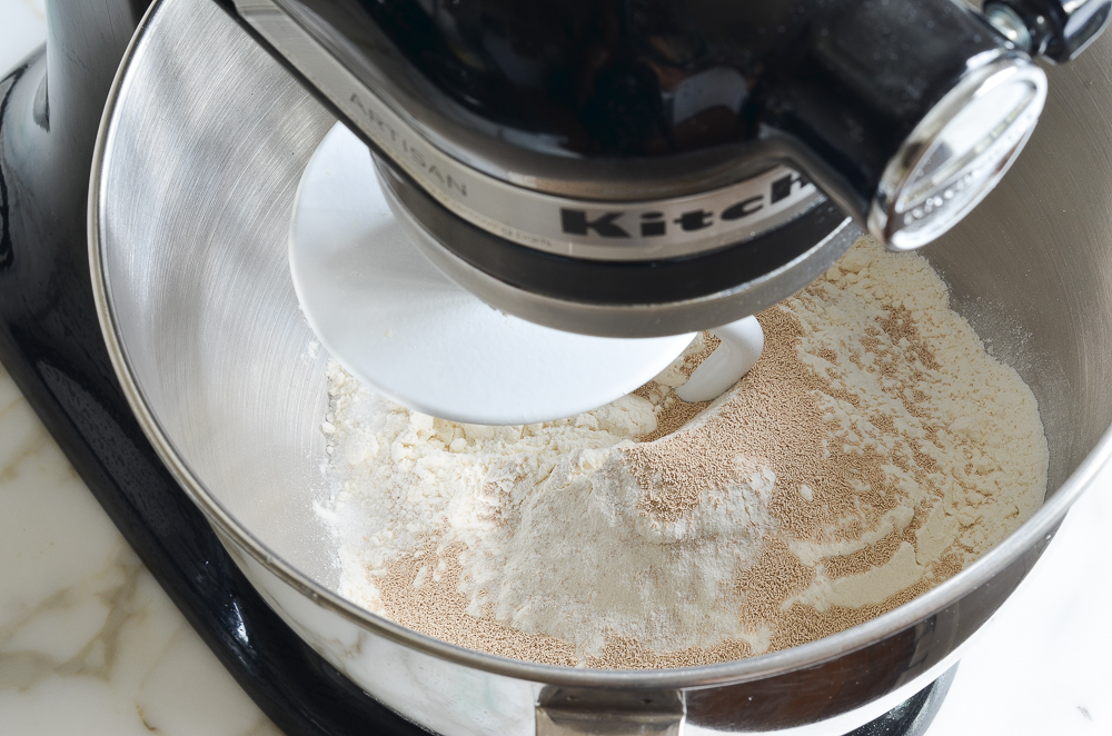 flour, salt, and yeast in mixer