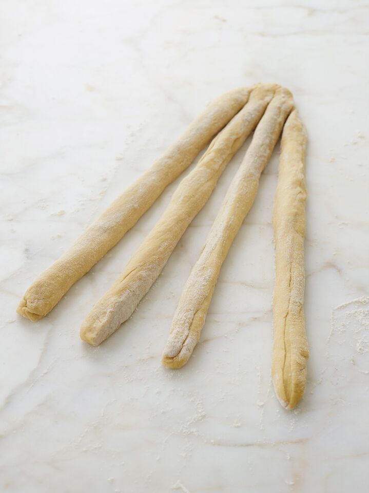 four strands of challah dough