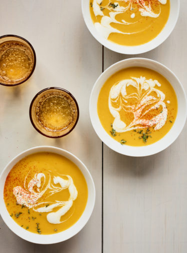 Bowls of pumpkin soup.