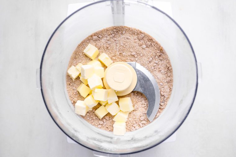 flour with the brown sugar, ¼ cup of the granulated sugar, salt, and butter in food processor