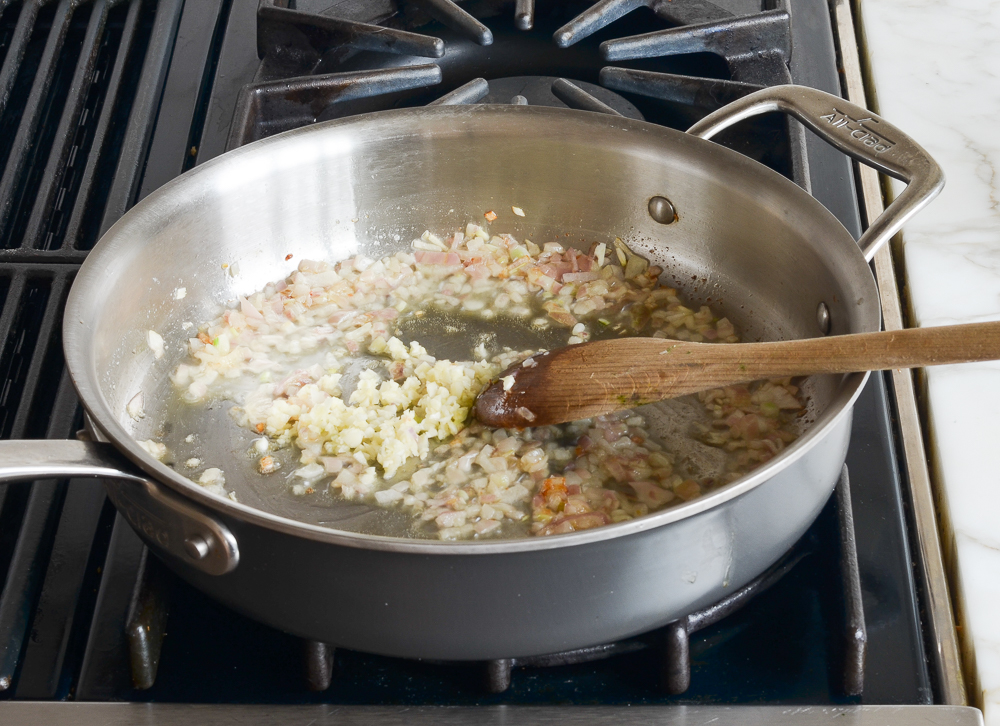 adding the garlic