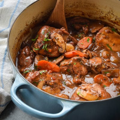Dutch oven of coq au vin.