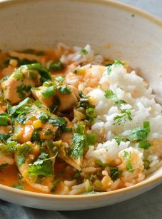 Thai red curry chicken in bowl with jasmine rice