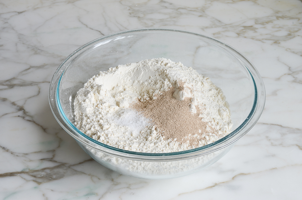 flour, yeast and salt in mixing bowl