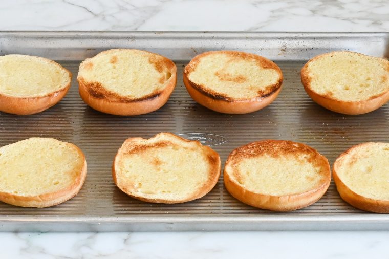 Baking sheet of toasted buns.