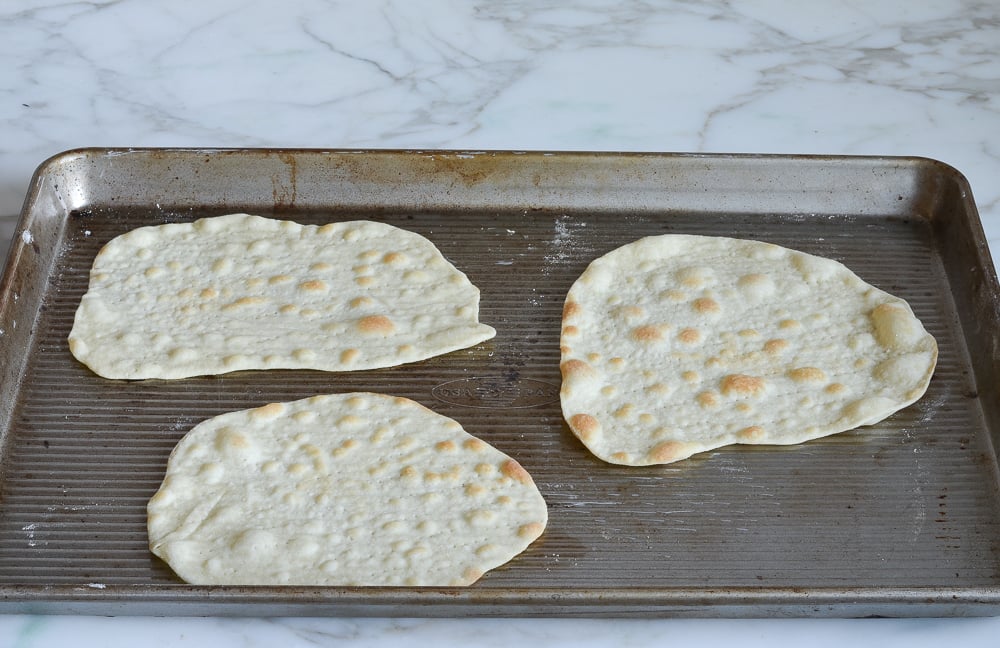 Dough with golden spots.