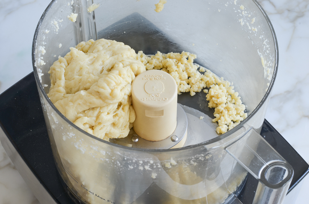 Ball of dough in a food processor.