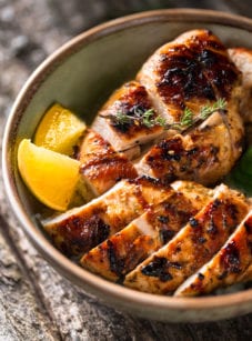 Bowl of sliced, grilled chicken.