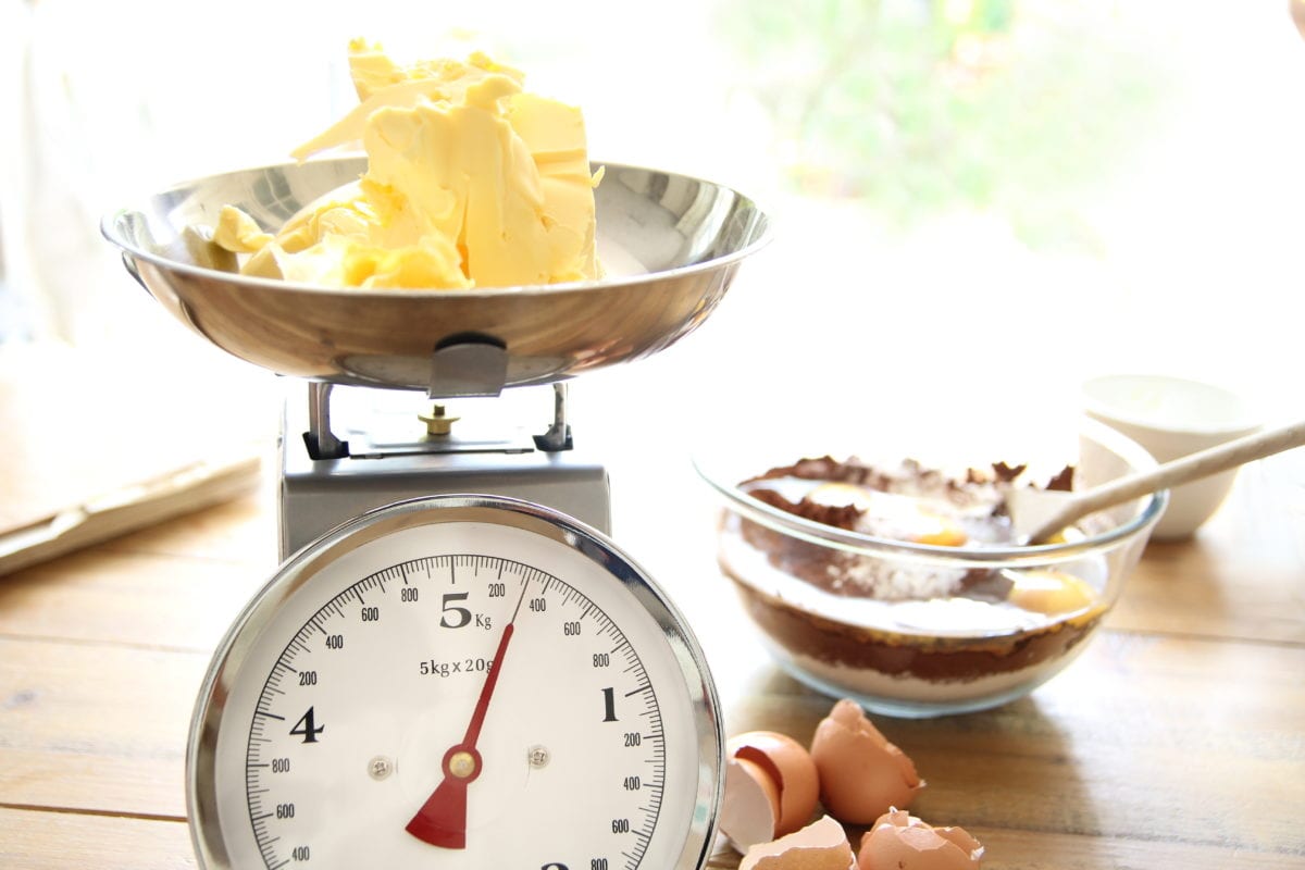 Butter on a kitchen scale.