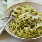 linguine with arugula walnut pesto in bowl