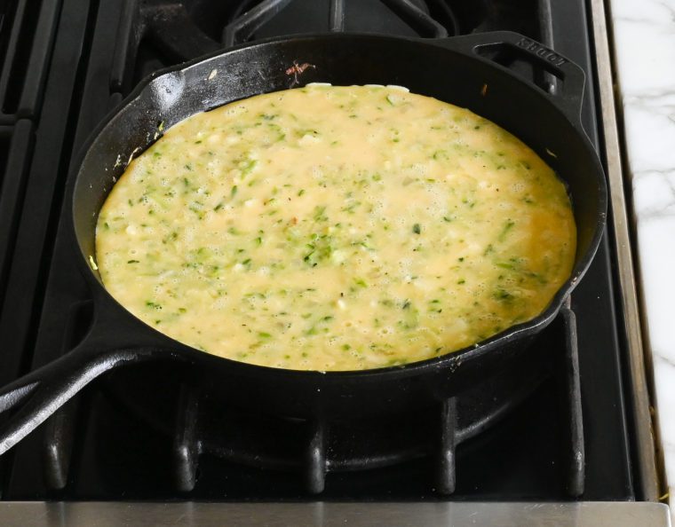 frittata mixture poured back in pan