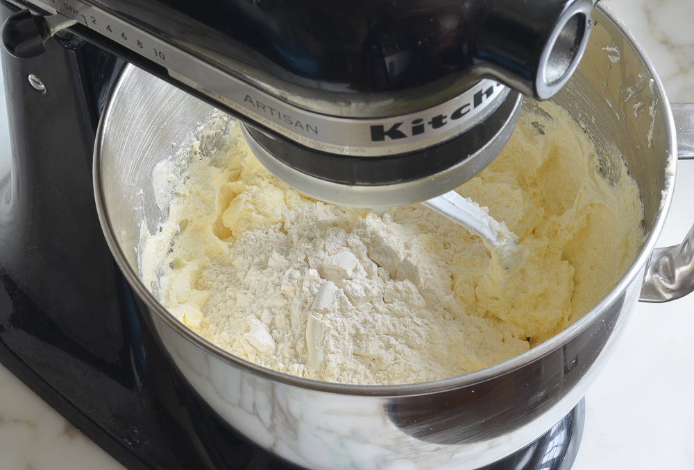 adding the dry ingredients to the batter
