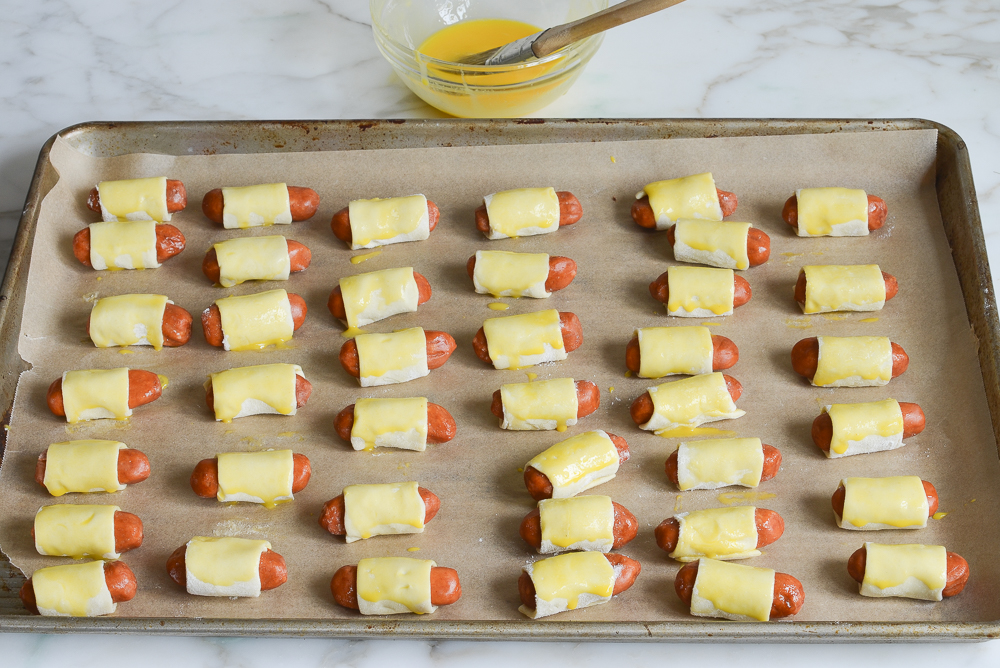 pigs in a blanket brushed with egg wash