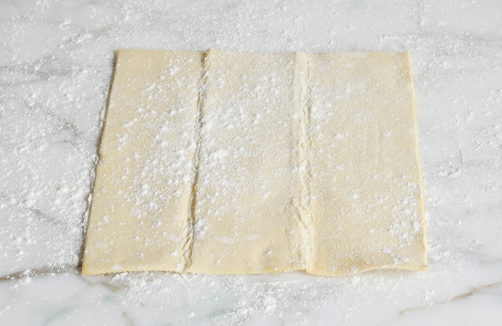 puff pastry sheet on floured work surface