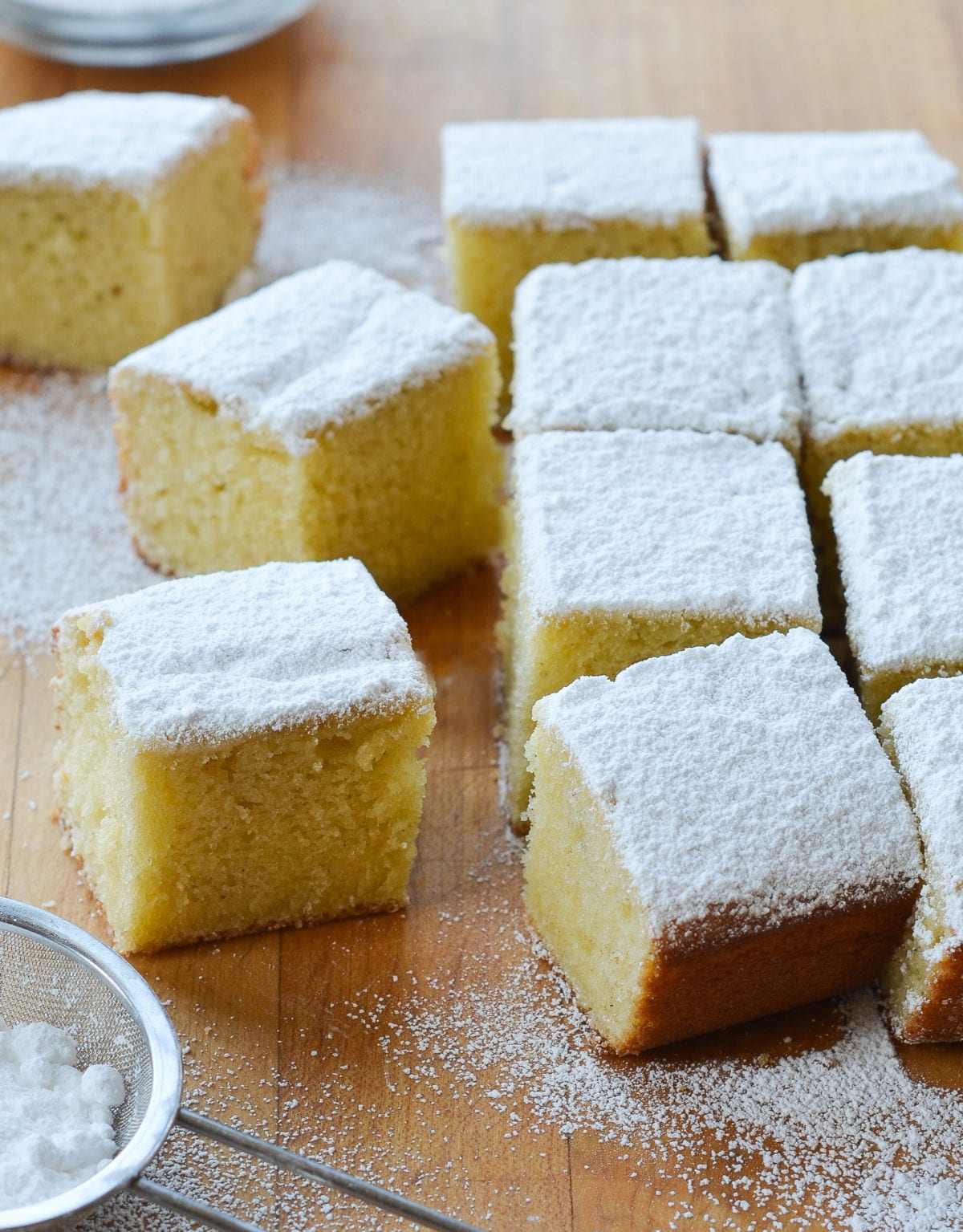 Pieces of powdered donut cake.