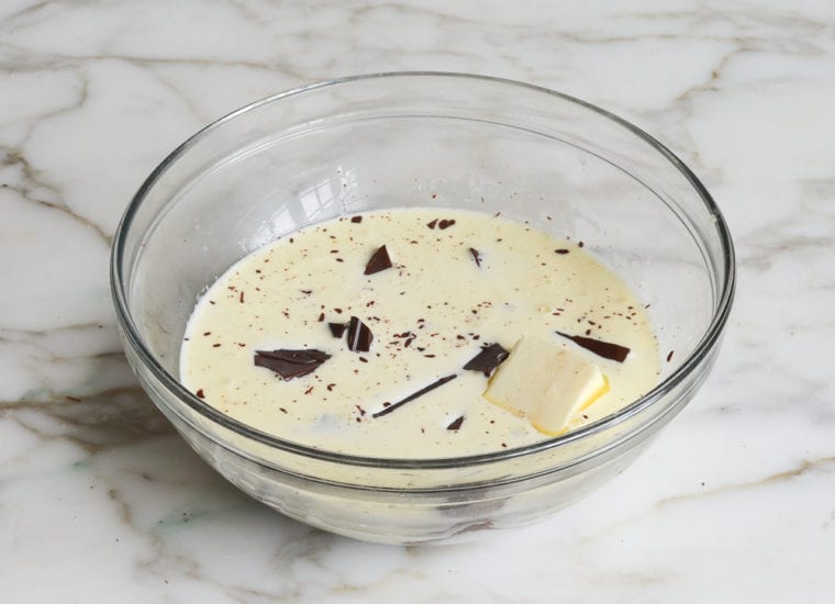 cream, chocolate and butter in bowl