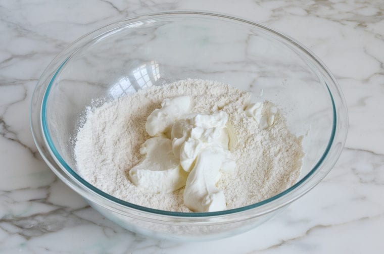 adding Greek yogurt to dry ingredients