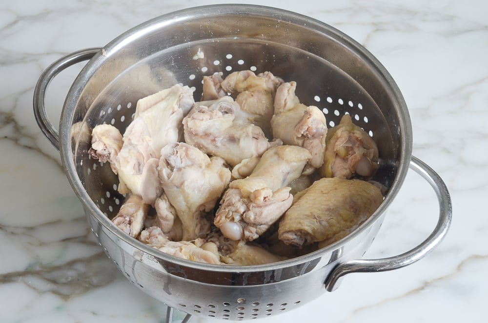 draining the chicken wings