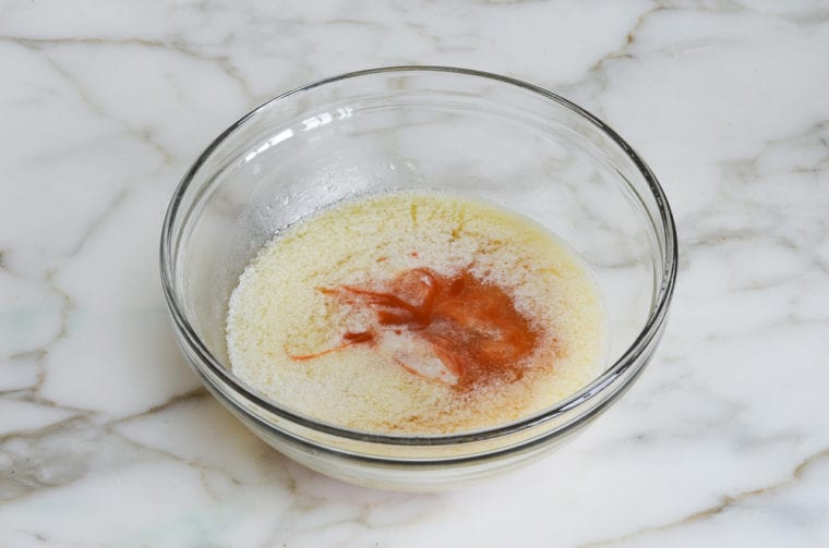 butter and hot sauce in bowl