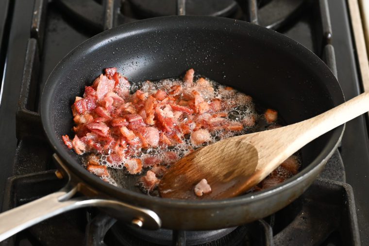 crisp cooked bacon in skillet