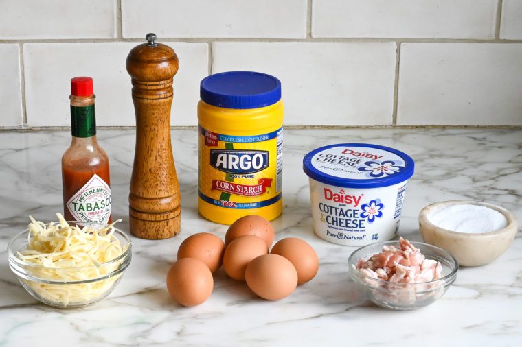 Egg bite ingredients including bacon, cottage cheese, and Tabasco.