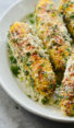 Plate of grilled Mexican street corn (elote.)