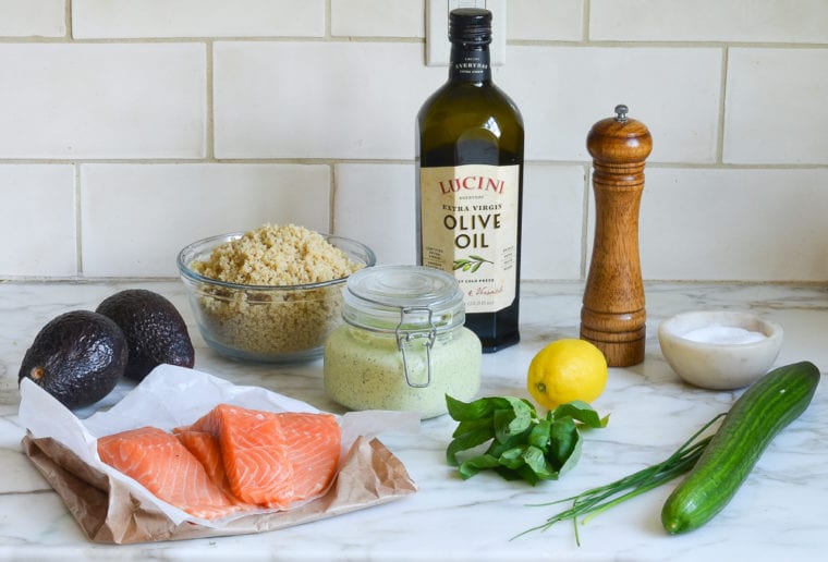 Salmon ingredients including lemon, olive oil, and pepper.