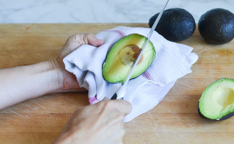 removing the pit from the avocado