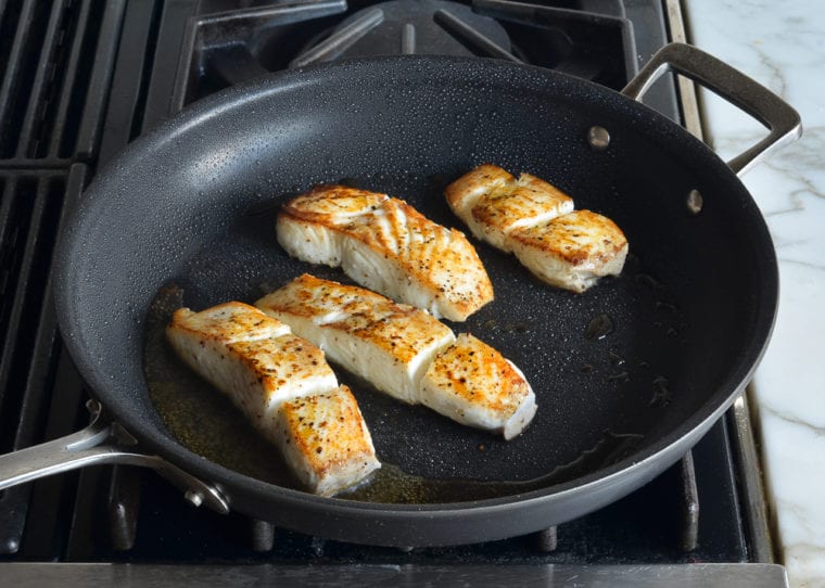 pan-searing halibut on second side
