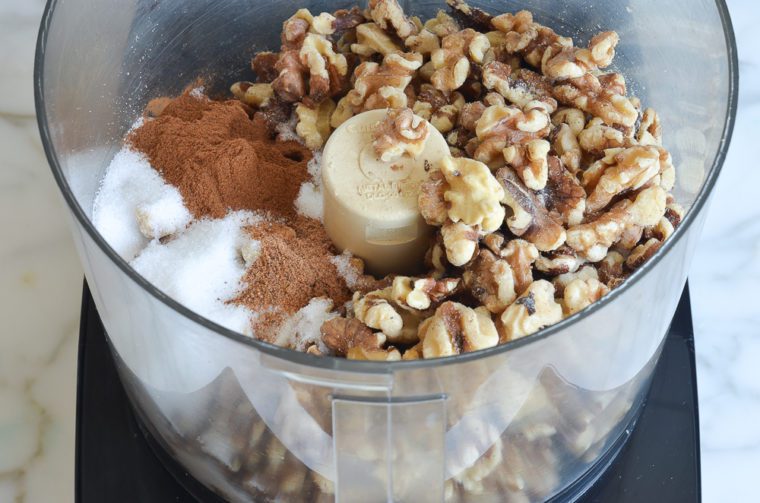 walnuts, sugar, cinnamon, and nutmeg in food processor