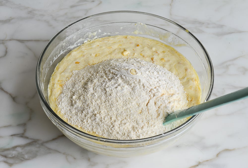 adding the dry ingredients to the wet ingredients