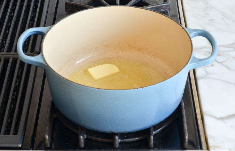 melting butter in Dutch oven