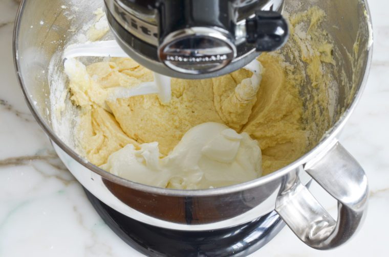 adding the sour cream to the batter