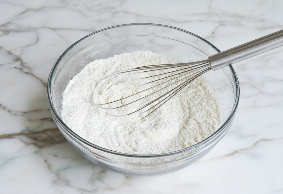 Whisked dry ingredients in a mixing bowl.