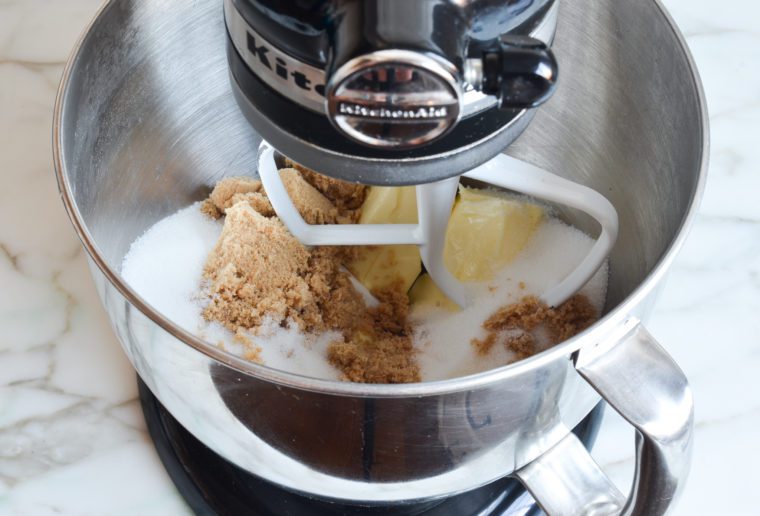 butter and sugars in bowl of electric mixer