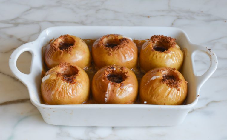 Baking dish of baked apples.