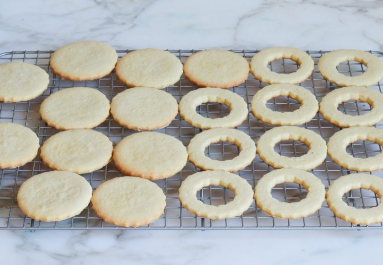 linzer cookies cooling on rack