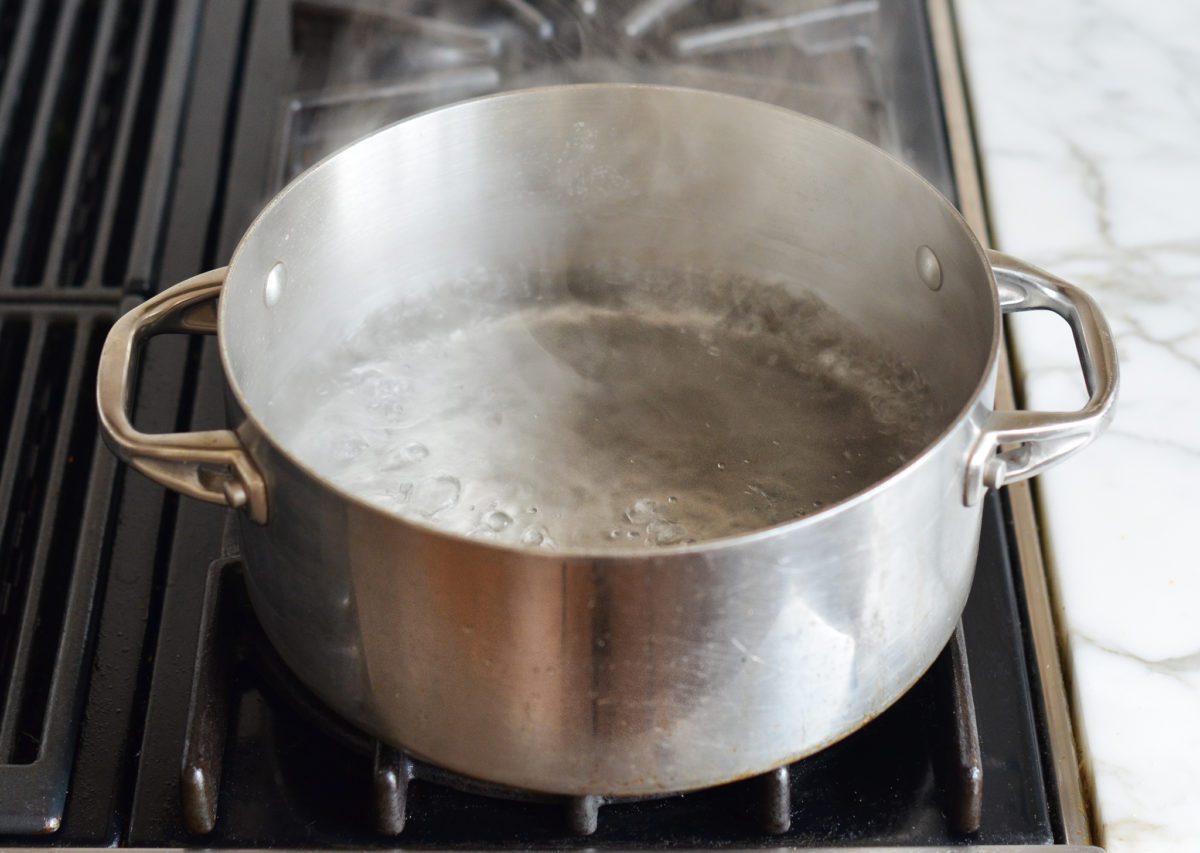 bringing water, salt and sugar to a boil for shrimp cocktail