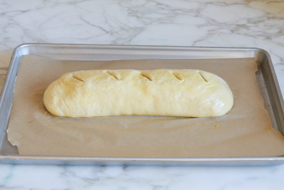 brushing stromboli with egg wash