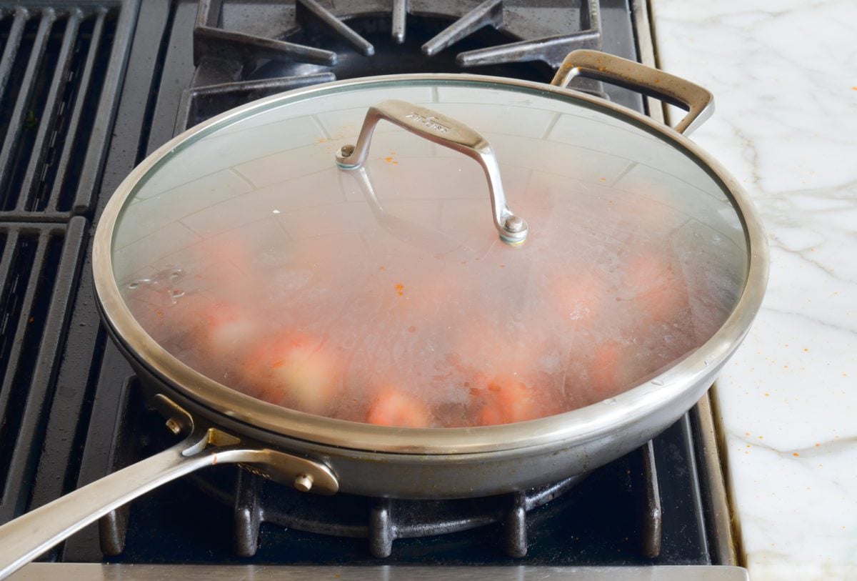 covering turkey meatballs and simmering until cooked through