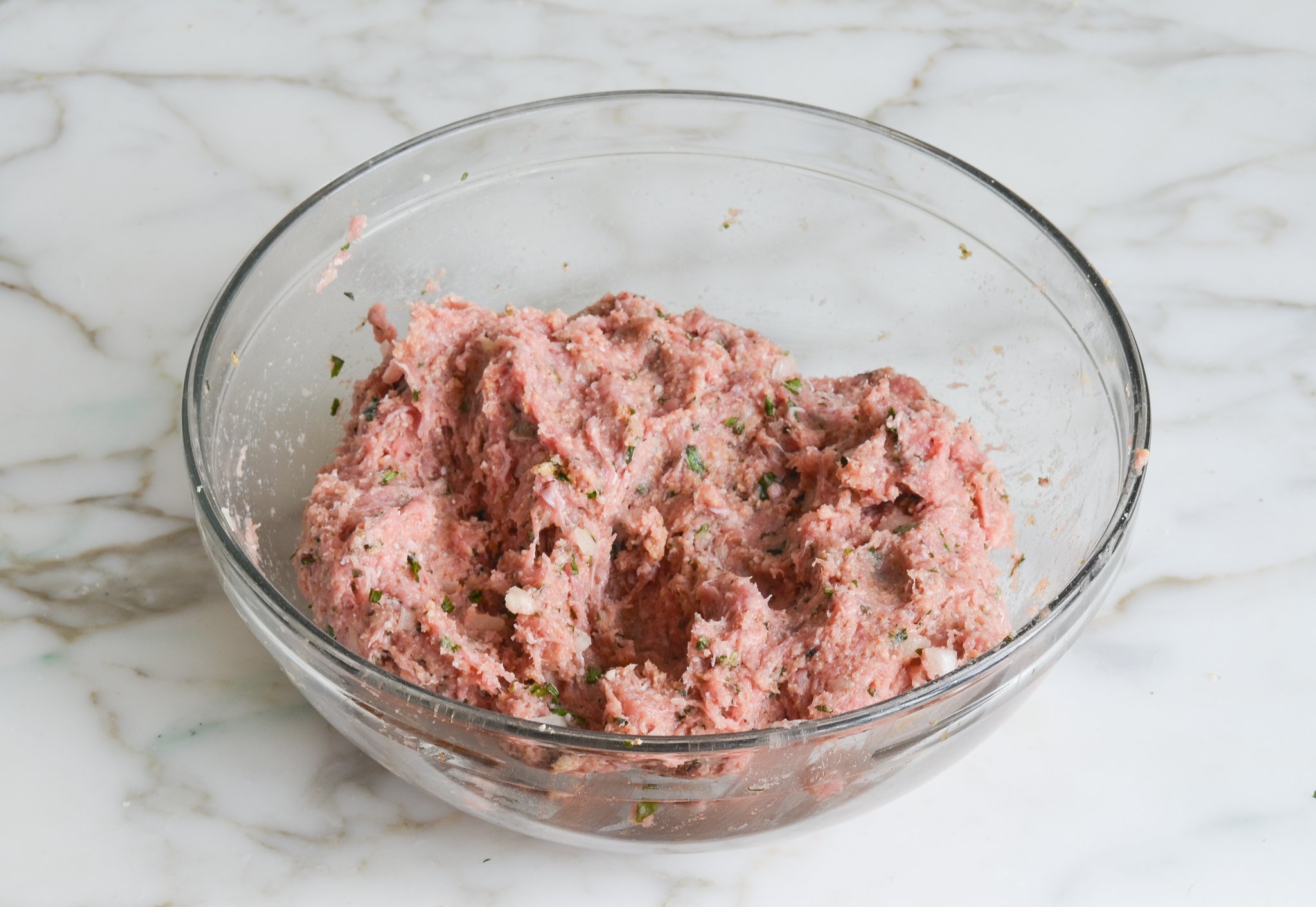 Turkey meatballs mixture mixed together in a bowl.