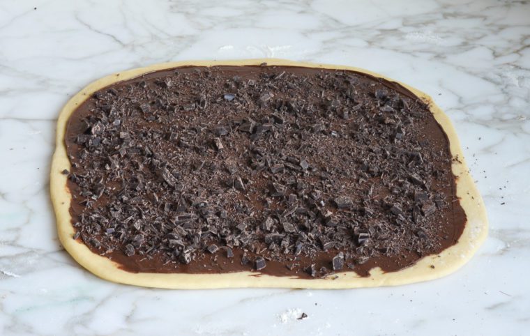 chocolate sprinkled over dough