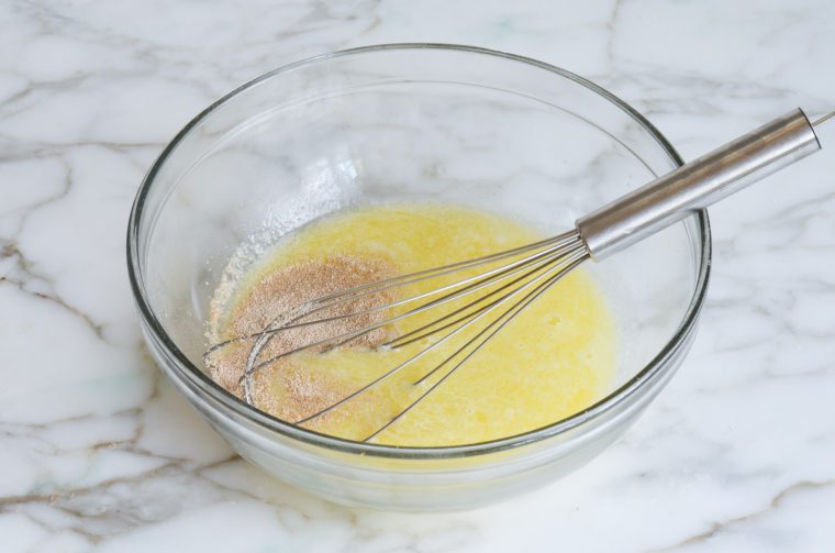 butter, water, sugar, salt and yeast in bowl