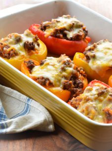 Stuffed peppers in a baking dish.