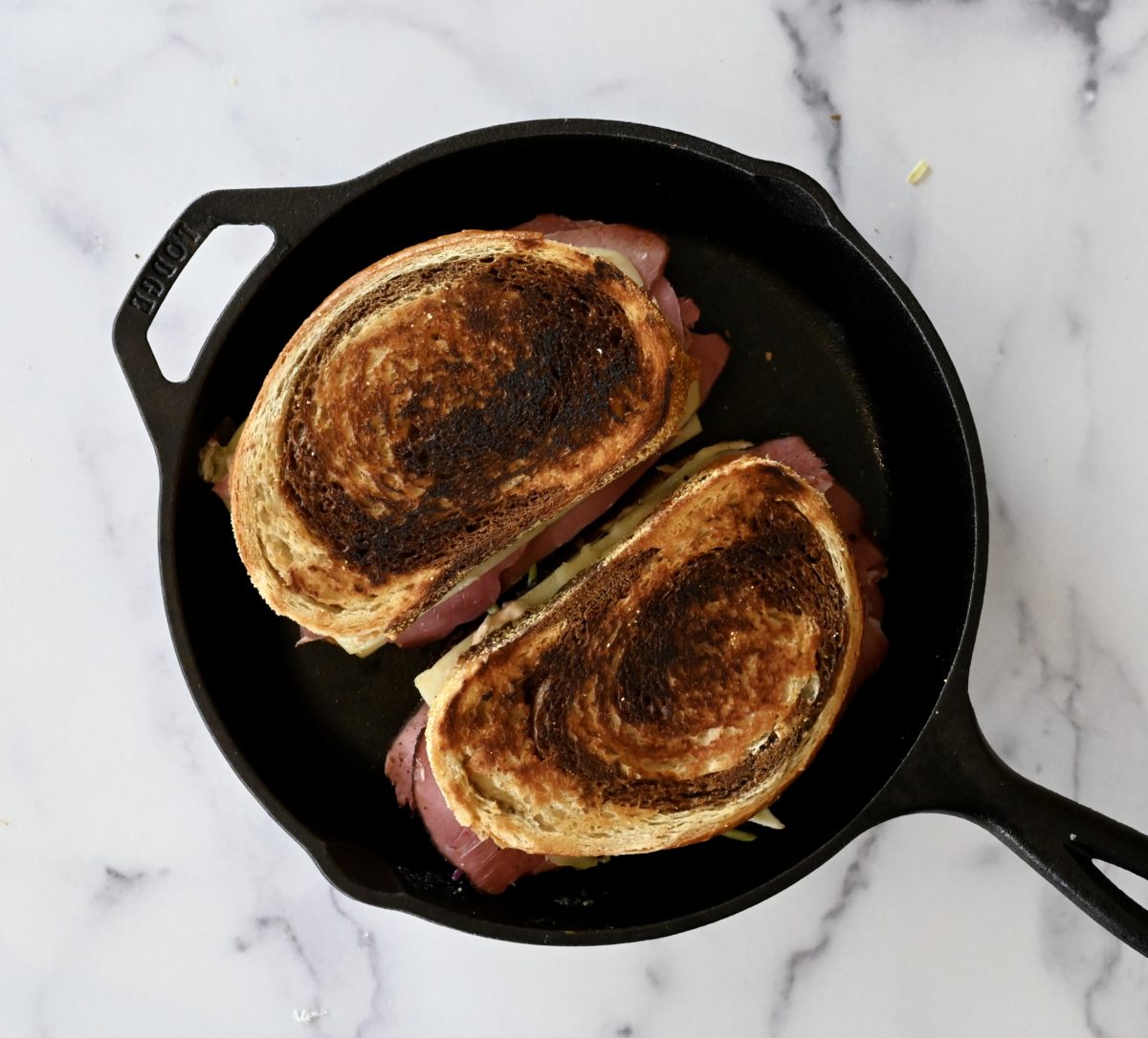 Cooking Reubens in skillet