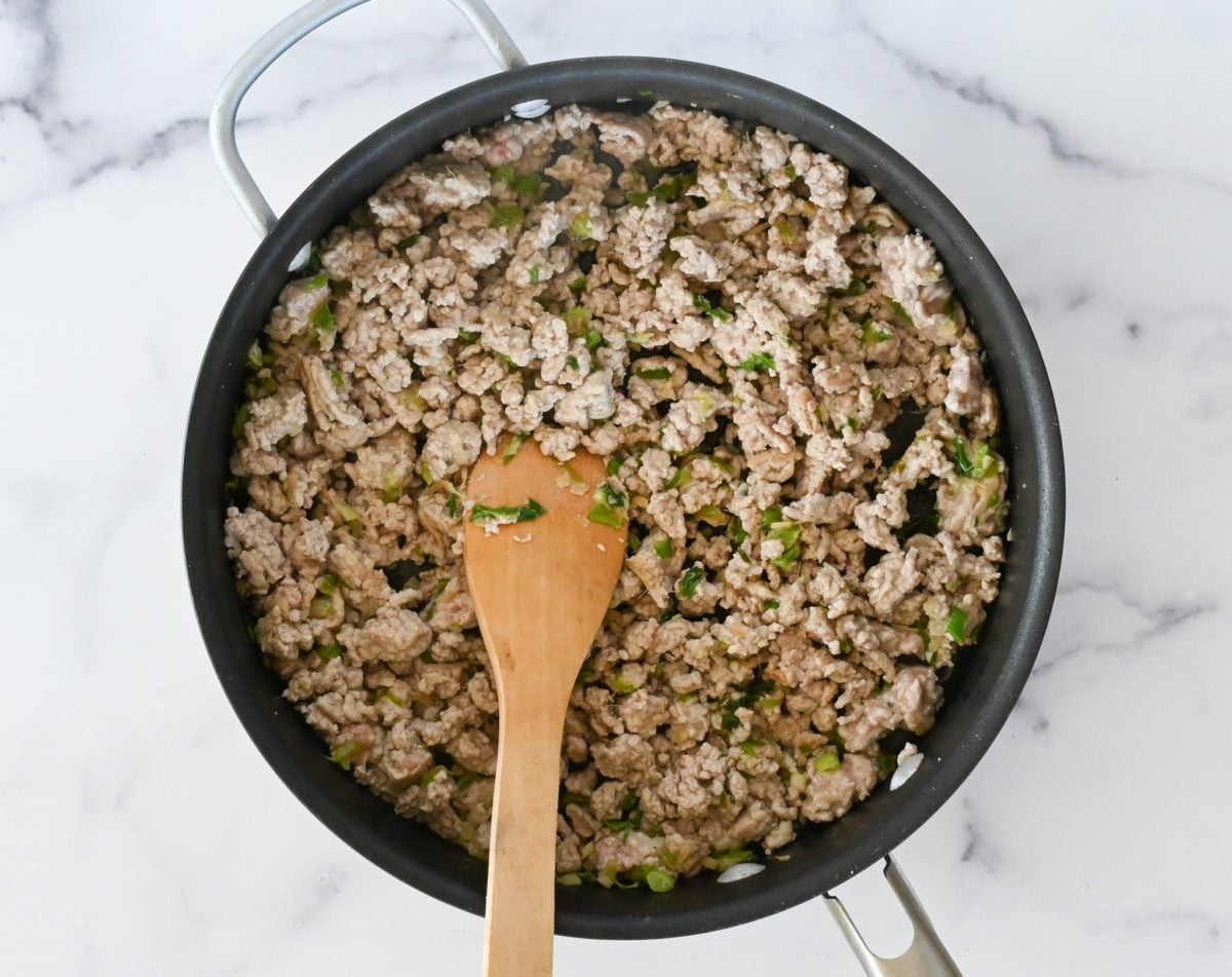 browned pork in skillet