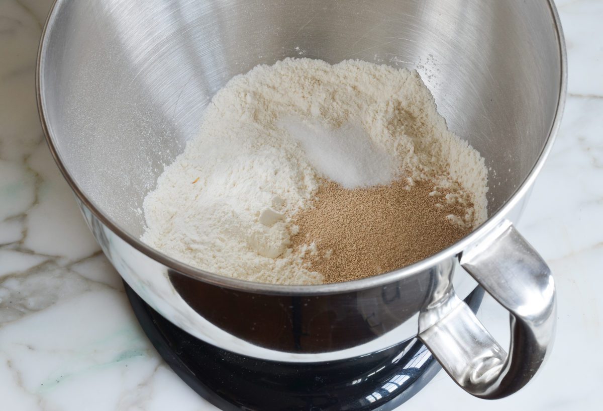flour, yeast, and salt in mixing bowl.