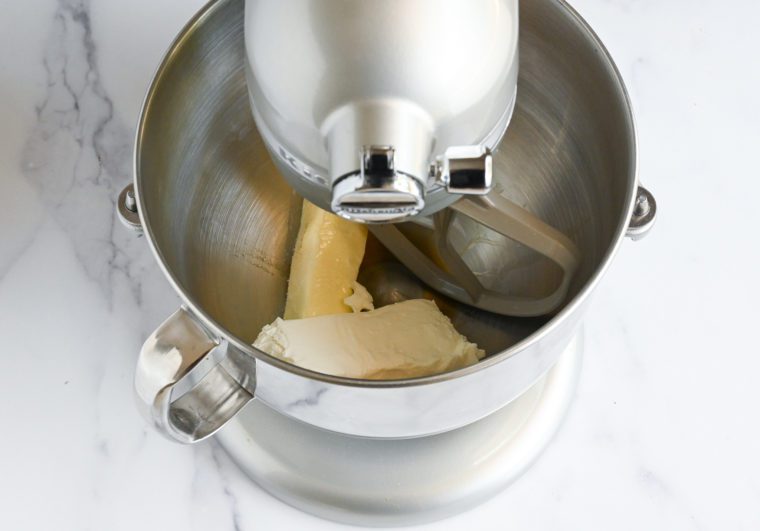 butter, cream cheese and vanilla in mixer
