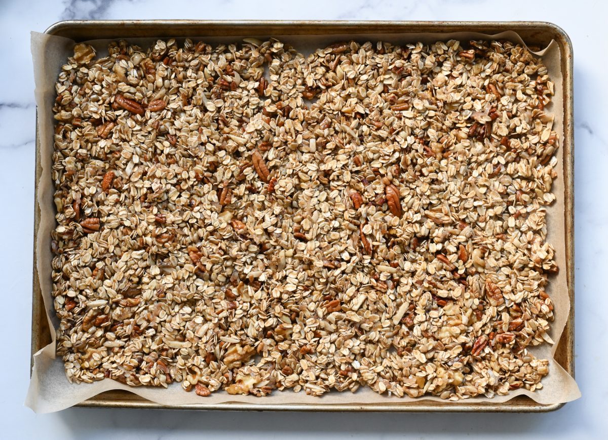 mixture spread into an even layer on the prepared baking sheet